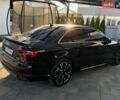 Черный Ауди А4, объемом двигателя 1.98 л и пробегом 125 тыс. км за 22800 $, фото 1 на Automoto.ua