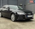 Черный Ауди А4, объемом двигателя 2 л и пробегом 209 тыс. км за 16950 $, фото 1 на Automoto.ua