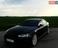 Черный Ауди А4, объемом двигателя 1.98 л и пробегом 227 тыс. км за 16999 $, фото 1 на Automoto.ua