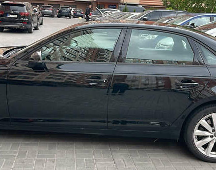 Черный Ауди А4, объемом двигателя 2 л и пробегом 70 тыс. км за 18500 $, фото 1 на Automoto.ua