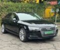 Черный Ауди А4, объемом двигателя 2 л и пробегом 140 тыс. км за 19900 $, фото 1 на Automoto.ua