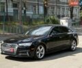 Черный Ауди А4, объемом двигателя 2 л и пробегом 170 тыс. км за 16490 $, фото 1 на Automoto.ua