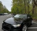 Чорний Ауді А4, об'ємом двигуна 2 л та пробігом 144 тис. км за 9800 $, фото 1 на Automoto.ua