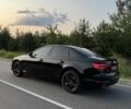 Черный Ауди А4, объемом двигателя 2 л и пробегом 230 тыс. км за 14999 $, фото 1 на Automoto.ua