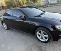 Чорний Ауді А4, об'ємом двигуна 2 л та пробігом 205 тис. км за 16462 $, фото 1 на Automoto.ua