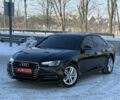 Черный Ауди А4, объемом двигателя 2 л и пробегом 264 тыс. км за 17500 $, фото 1 на Automoto.ua