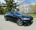 Черный Ауди А4, объемом двигателя 2 л и пробегом 160 тыс. км за 16794 $, фото 5 на Automoto.ua