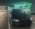 Чорний Ауді А4, об'ємом двигуна 2 л та пробігом 124 тис. км за 23950 $, фото 1 на Automoto.ua