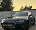 Черный Ауди А4, объемом двигателя 1.98 л и пробегом 127 тыс. км за 16300 $, фото 1 на Automoto.ua