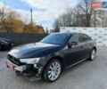 Черный Ауди А4, объемом двигателя 2 л и пробегом 194 тыс. км за 12400 $, фото 1 на Automoto.ua