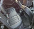 Черный Ауди А4, объемом двигателя 1.98 л и пробегом 95 тыс. км за 22000 $, фото 16 на Automoto.ua
