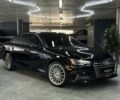 Чорний Ауді А4, об'ємом двигуна 2 л та пробігом 124 тис. км за 18700 $, фото 1 на Automoto.ua