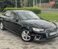 Черный Ауди А4, объемом двигателя 2 л и пробегом 125 тыс. км за 19800 $, фото 3 на Automoto.ua