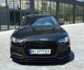 Черный Ауди А4, объемом двигателя 2 л и пробегом 139 тыс. км за 18878 $, фото 1 на Automoto.ua