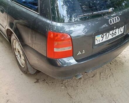 Черный Ауди А4, объемом двигателя 1.6 л и пробегом 309 тыс. км за 3700 $, фото 1 на Automoto.ua
