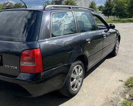 Черный Ауди А4, объемом двигателя 1.6 л и пробегом 352 тыс. км за 4000 $, фото 4 на Automoto.ua