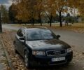 Черный Ауди А4, объемом двигателя 2.5 л и пробегом 334 тыс. км за 3400 $, фото 1 на Automoto.ua