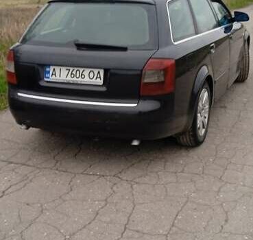 Черный Ауди А4, объемом двигателя 2.5 л и пробегом 283 тыс. км за 5500 $, фото 1 на Automoto.ua