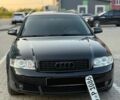 Чорний Ауді А4, об'ємом двигуна 2 л та пробігом 242 тис. км за 5999 $, фото 1 на Automoto.ua