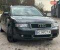 Чорний Ауді А4, об'ємом двигуна 1.8 л та пробігом 303 тис. км за 6000 $, фото 1 на Automoto.ua