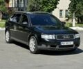 Черный Ауди А4, объемом двигателя 2 л и пробегом 235 тыс. км за 3599 $, фото 1 на Automoto.ua