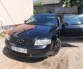 Черный Ауди А4, объемом двигателя 2.5 л и пробегом 313 тыс. км за 4400 $, фото 1 на Automoto.ua