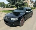Черный Ауди А4, объемом двигателя 2.5 л и пробегом 400 тыс. км за 3700 $, фото 1 на Automoto.ua