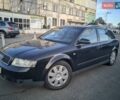 Черный Ауди А4, объемом двигателя 2.5 л и пробегом 321 тыс. км за 5000 $, фото 1 на Automoto.ua