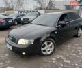 Черный Ауди А4, объемом двигателя 2.5 л и пробегом 329 тыс. км за 6700 $, фото 1 на Automoto.ua