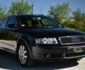 Черный Ауди А4, объемом двигателя 1.6 л и пробегом 187 тыс. км за 6750 $, фото 1 на Automoto.ua
