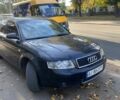 Черный Ауди А4, объемом двигателя 2.5 л и пробегом 370 тыс. км за 3999 $, фото 1 на Automoto.ua