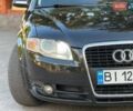 Черный Ауди А4, объемом двигателя 2.5 л и пробегом 300 тыс. км за 6600 $, фото 1 на Automoto.ua