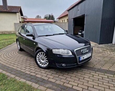 Черный Ауди А4, объемом двигателя 2 л и пробегом 265 тыс. км за 1750 $, фото 1 на Automoto.ua