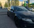 Черный Ауди А4, объемом двигателя 2 л и пробегом 247 тыс. км за 9600 $, фото 1 на Automoto.ua