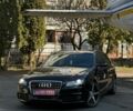 Черный Ауди А4, объемом двигателя 2 л и пробегом 239 тыс. км за 9599 $, фото 1 на Automoto.ua