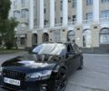 Чорний Ауді А4, об'ємом двигуна 2 л та пробігом 264 тис. км за 10579 $, фото 1 на Automoto.ua