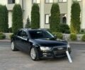 Чорний Ауді А4, об'ємом двигуна 2 л та пробігом 330 тис. км за 11467 $, фото 1 на Automoto.ua