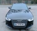 Черный Ауди А4, объемом двигателя 2 л и пробегом 255 тыс. км за 11700 $, фото 1 на Automoto.ua