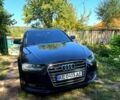 Черный Ауди А4, объемом двигателя 2 л и пробегом 247 тыс. км за 10400 $, фото 1 на Automoto.ua