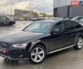 Чорний Ауді А4, об'ємом двигуна 2 л та пробігом 216 тис. км за 12990 $, фото 1 на Automoto.ua