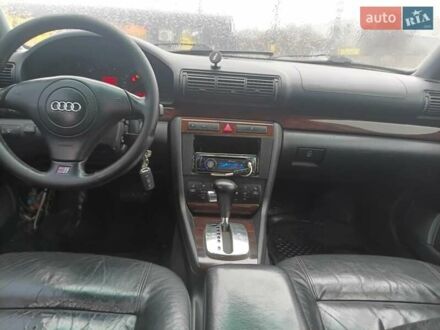 Черный Ауди А4, объемом двигателя 1.8 л и пробегом 100 тыс. км за 3500 $, фото 1 на Automoto.ua