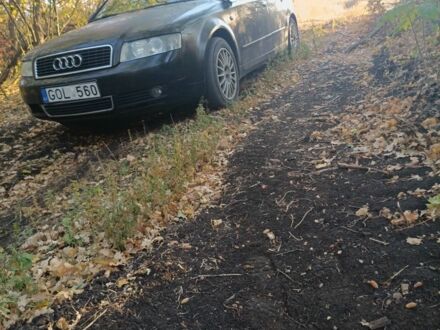 Черный Ауди А4, объемом двигателя 2 л и пробегом 300 тыс. км за 3000 $, фото 1 на Automoto.ua