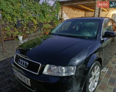 Чорний Ауді А4, об'ємом двигуна 2 л та пробігом 395 тис. км за 3900 $, фото 1 на Automoto.ua