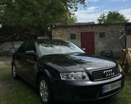 Черный Ауди А4, объемом двигателя 2 л и пробегом 215 тыс. км за 5400 $, фото 1 на Automoto.ua