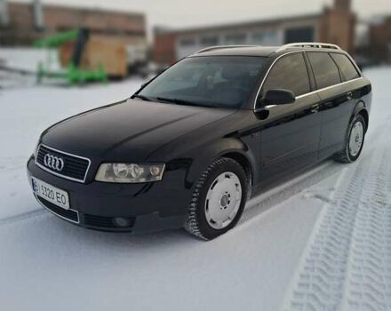Черный Ауди А4, объемом двигателя 2.5 л и пробегом 290 тыс. км за 6500 $, фото 1 на Automoto.ua