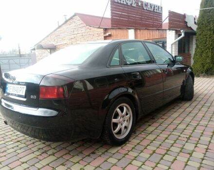 Чорний Ауді А4, об'ємом двигуна 2 л та пробігом 260 тис. км за 4999 $, фото 1 на Automoto.ua