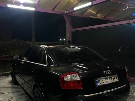Черный Ауди А4, объемом двигателя 2.5 л и пробегом 365 тыс. км за 4900 $, фото 1 на Automoto.ua