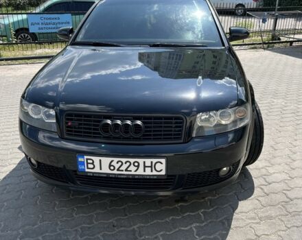 Черный Ауди А4, объемом двигателя 2 л и пробегом 215 тыс. км за 6500 $, фото 1 на Automoto.ua