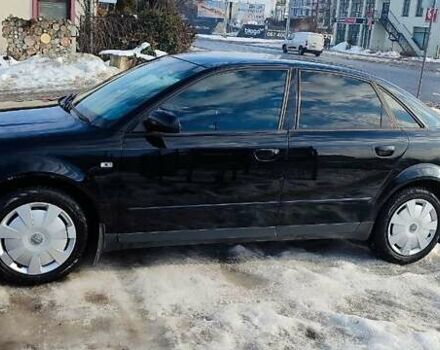 Чорний Ауді А4, об'ємом двигуна 2 л та пробігом 384 тис. км за 5700 $, фото 1 на Automoto.ua