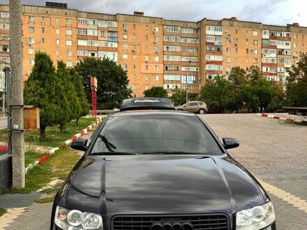 Черный Ауди А4, объемом двигателя 1.8 л и пробегом 325 тыс. км за 5300 $, фото 1 на Automoto.ua